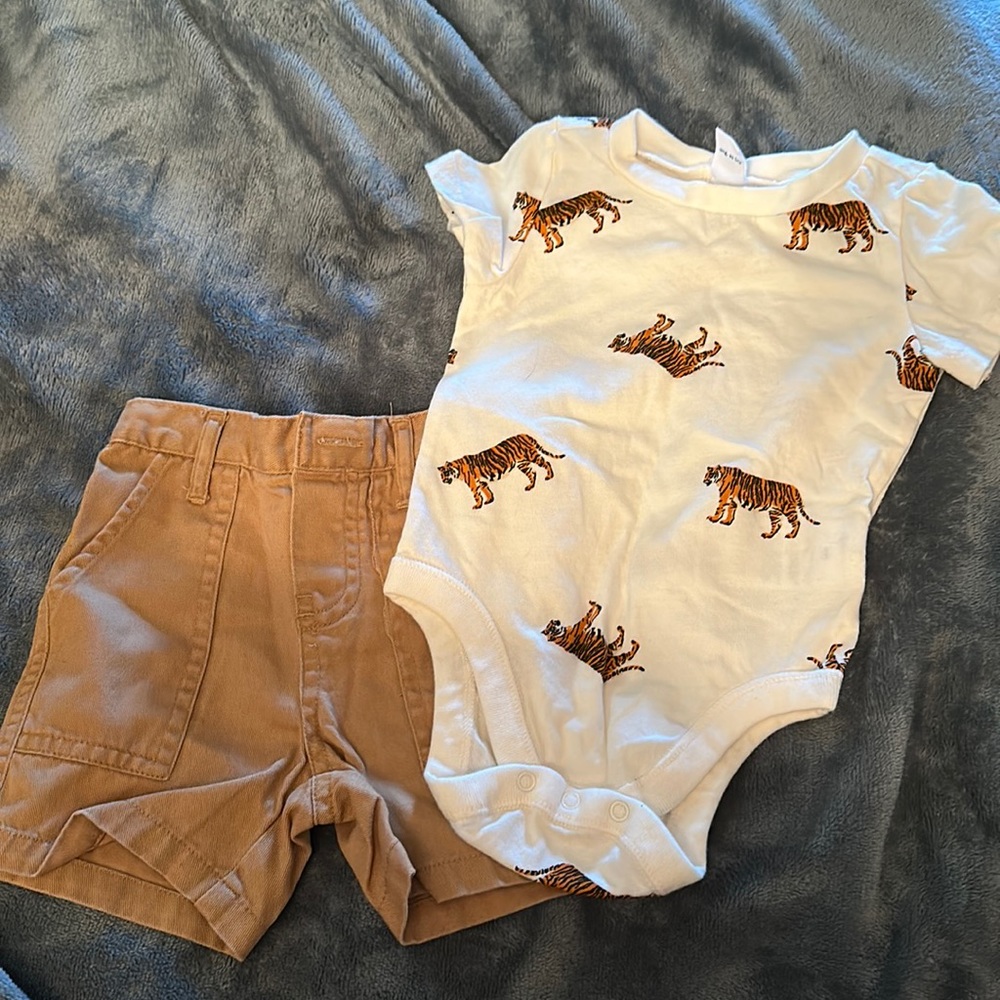 White tiger and baige shorts